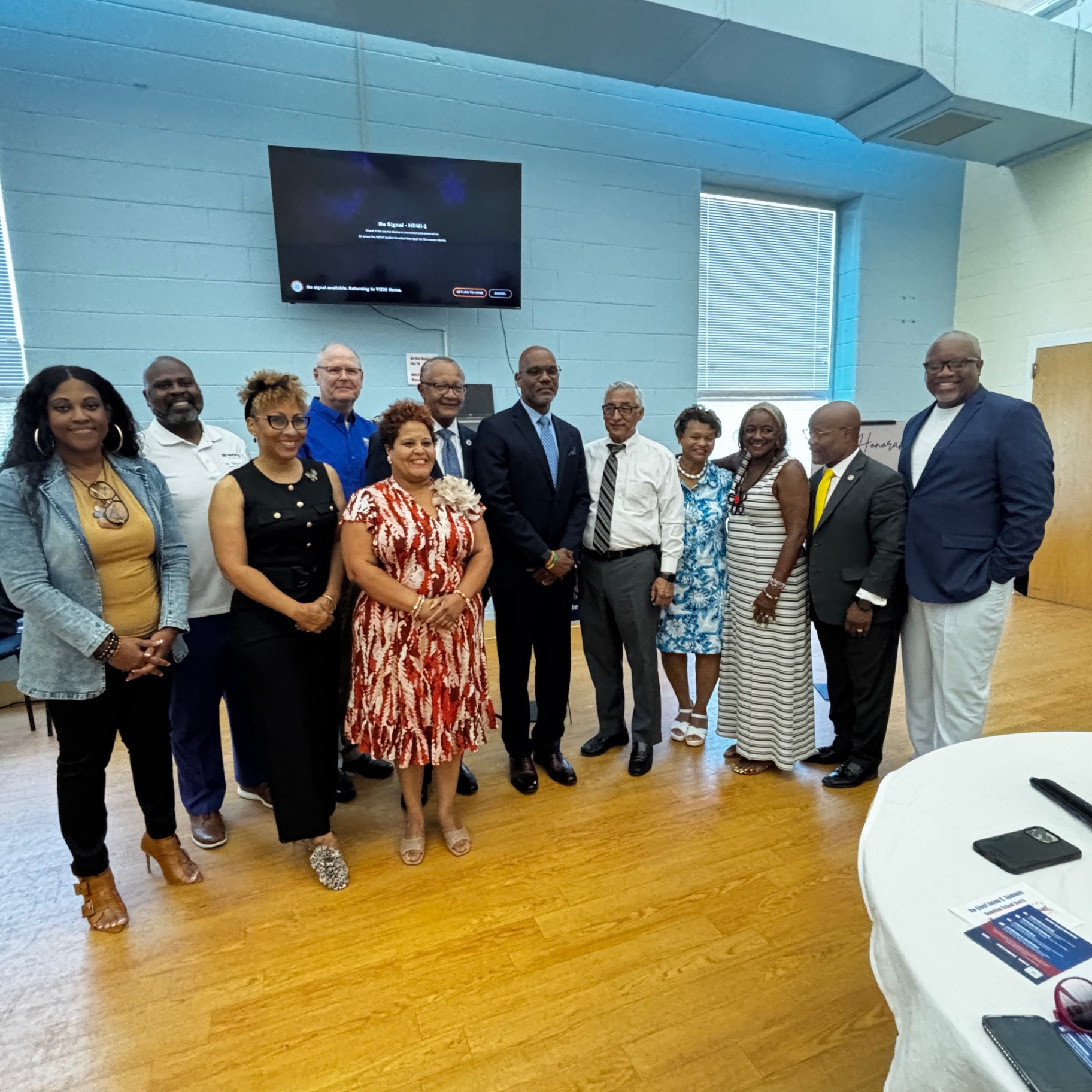 Group photo of community members and campaign team at the Jason Samuels kickoff school supply drive on August 23.